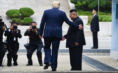 Trump takes 20 steps into North Korea, making history as first sitting US leader to enter hermit nation